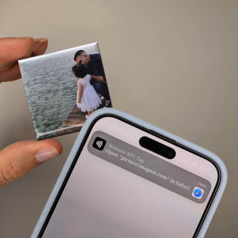 Smart NFC photo magnet on a refrigerator communicating with a smartphone
