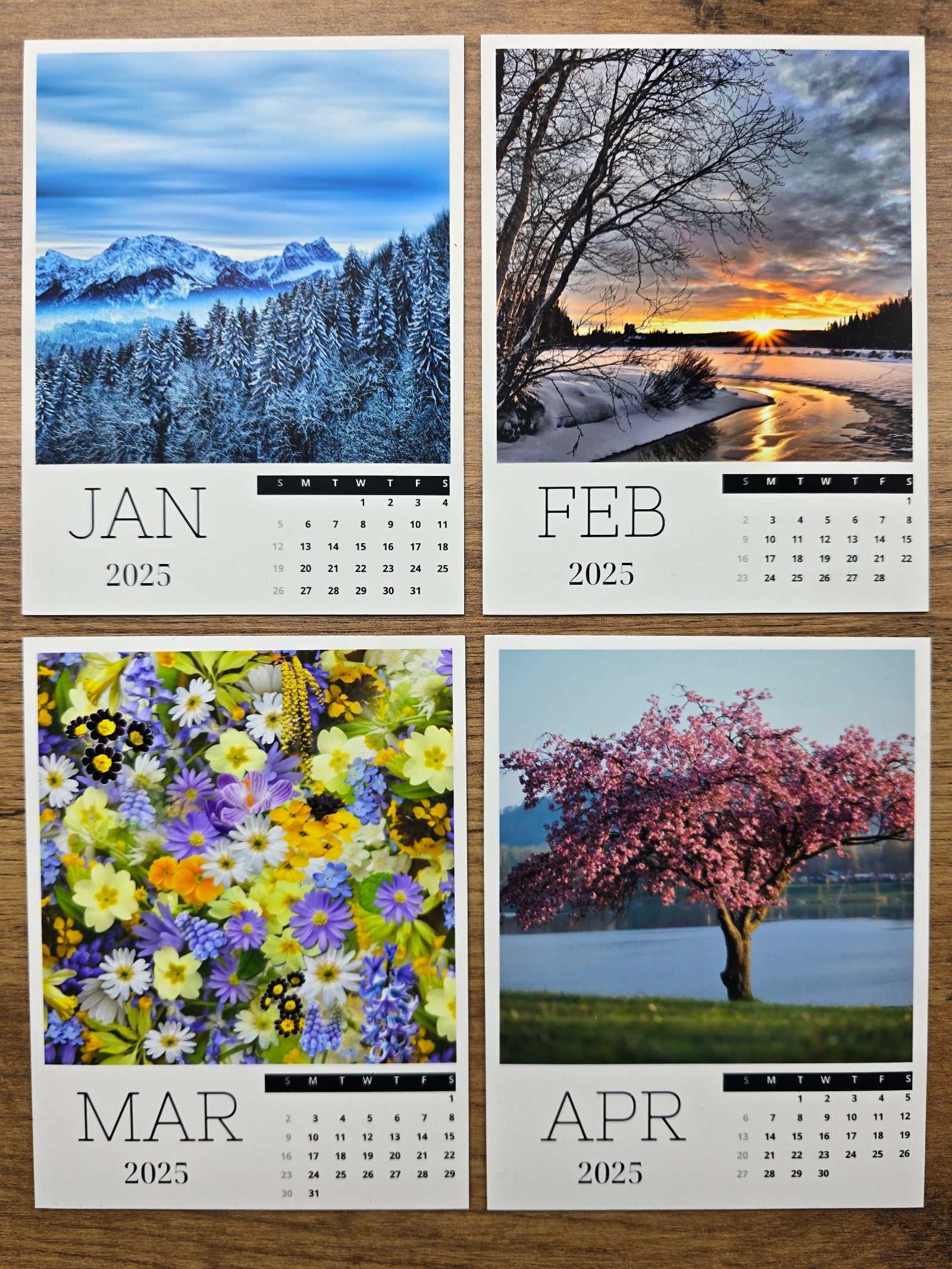 Four-month photo magnet calendar showing January, February, March, and April with corresponding scenic images.