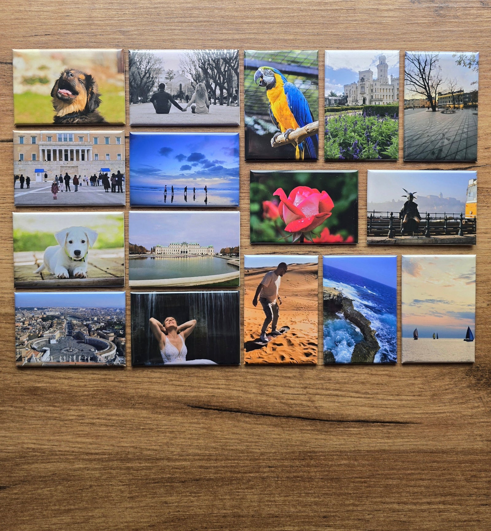 Collage of various photo magnets on a wooden surface